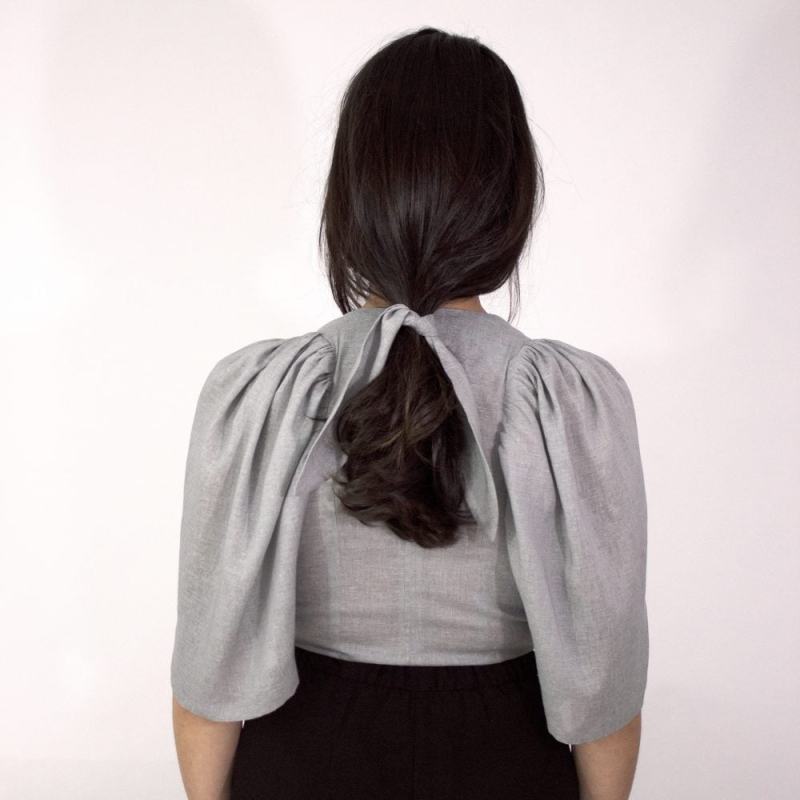 Woman wearing Classics Atelier Grey Top