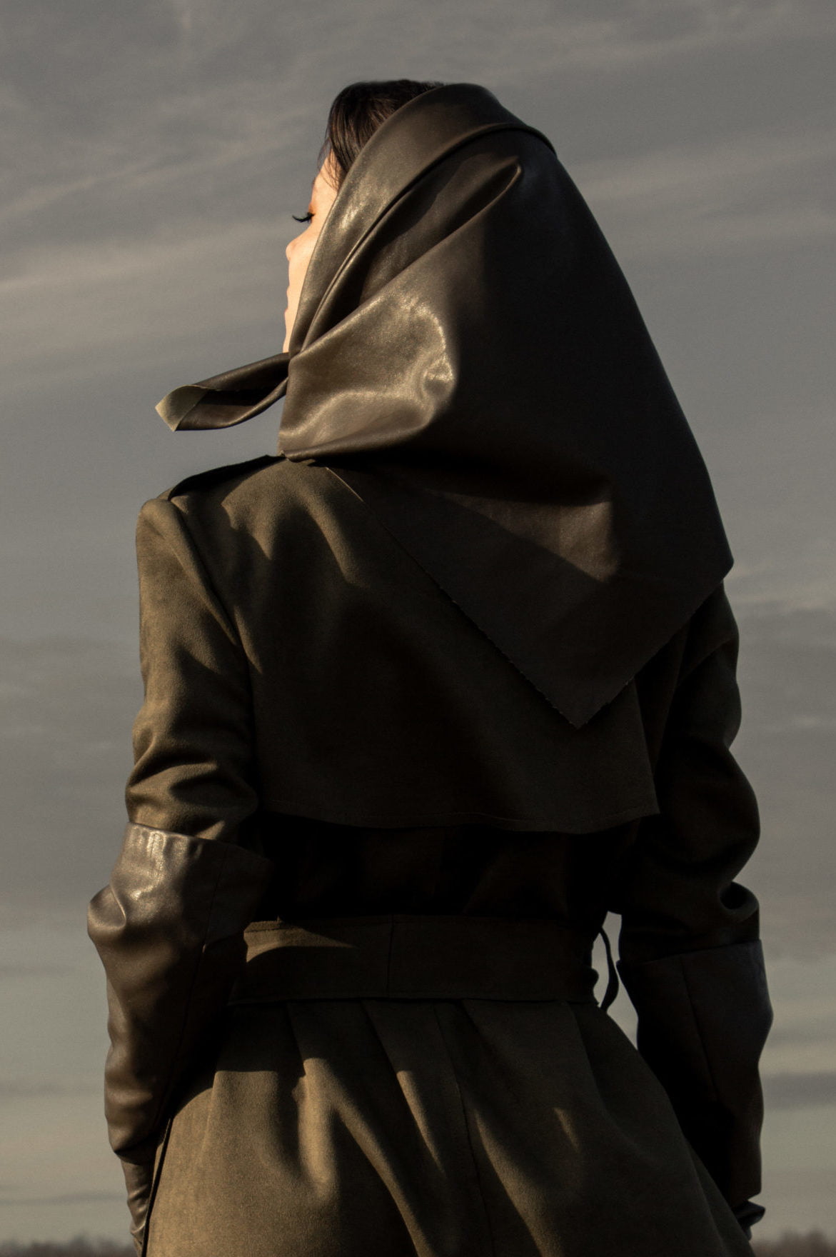 Woman wearing faux leather Babushka head scarf in cedar brown