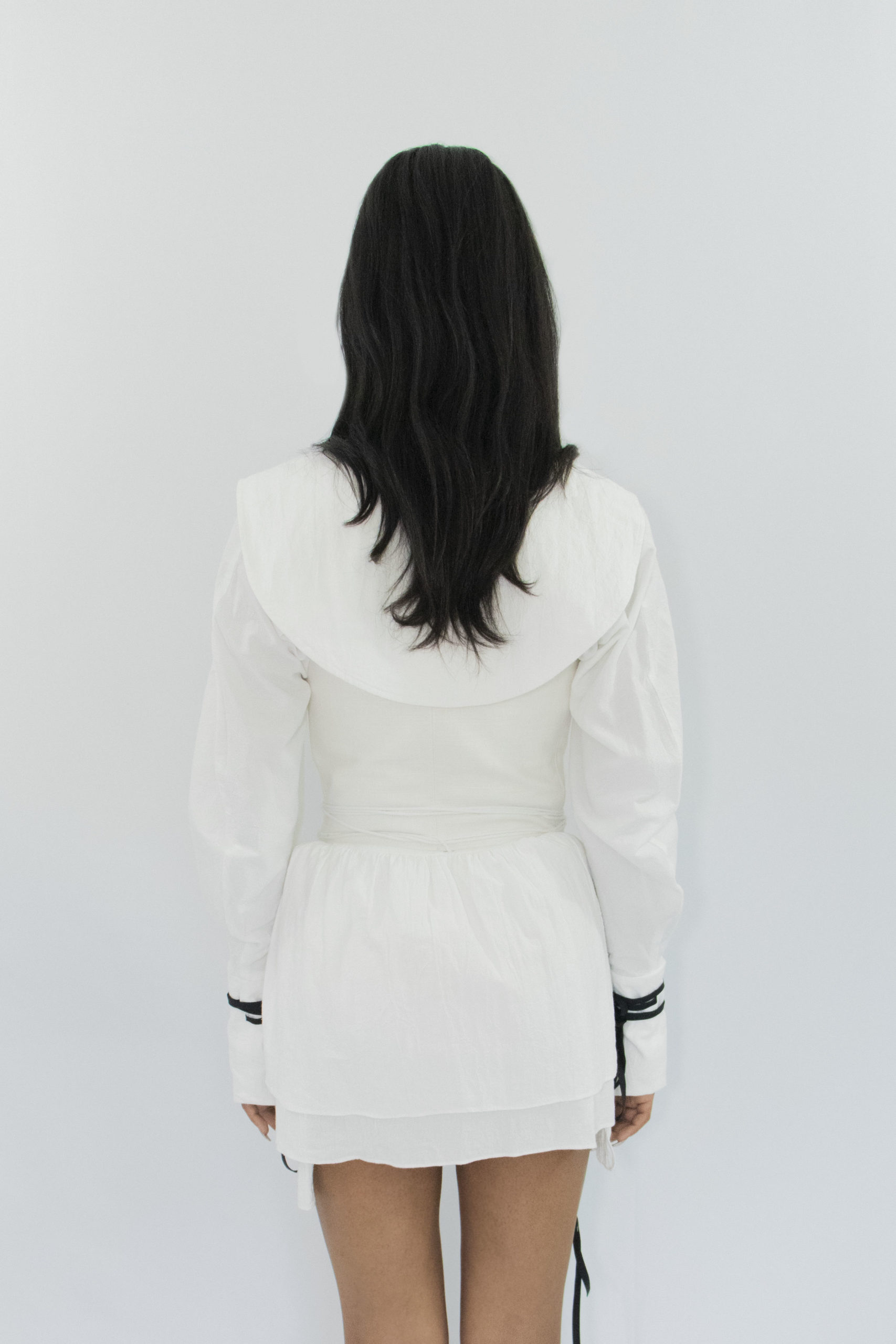 Woman wearing white zero waste cotton corset
