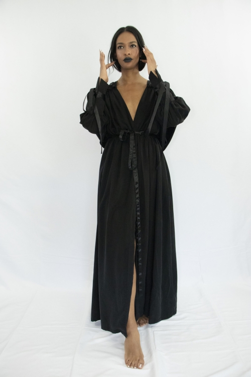 Woman wearing black tencel witch ritual summer dress