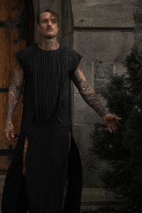 Man wearing long black dress